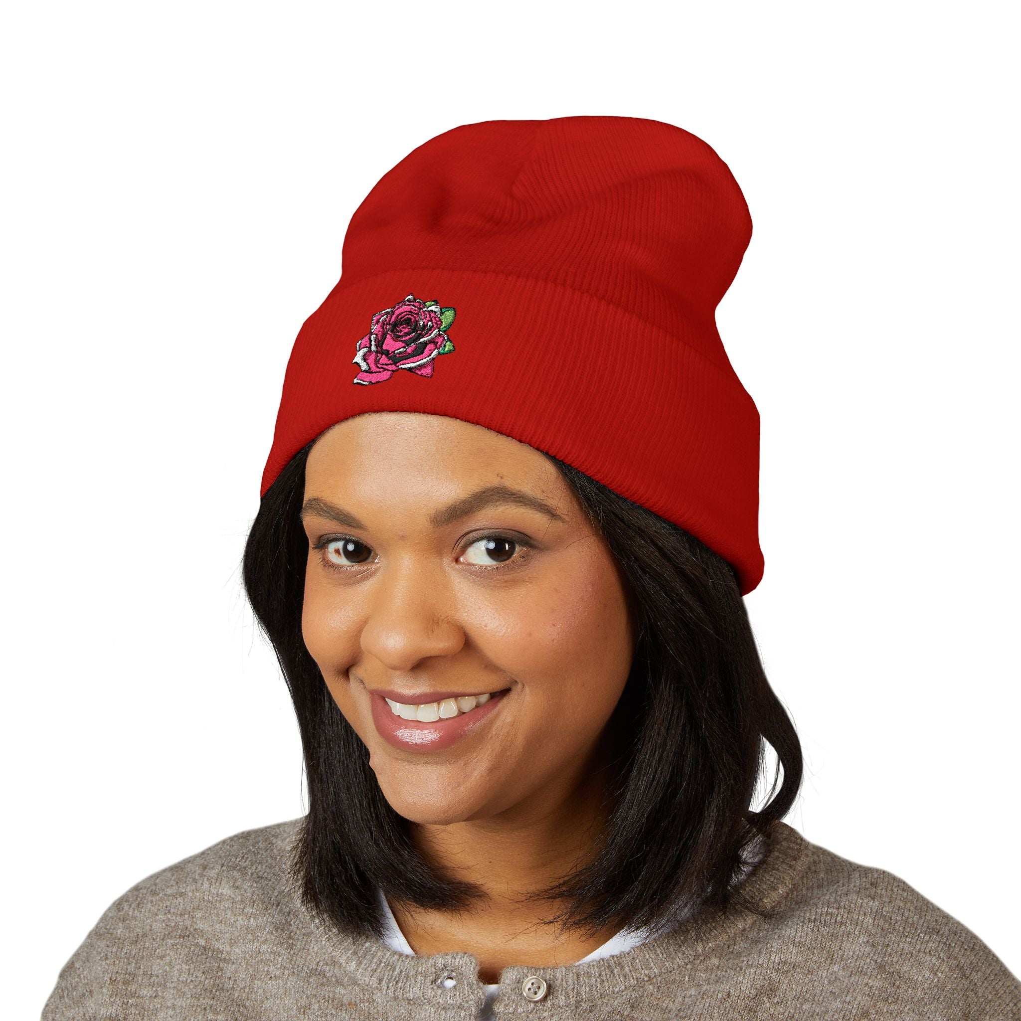 Person wearing a red beanie with 'YAHUSHA' logo on a white background