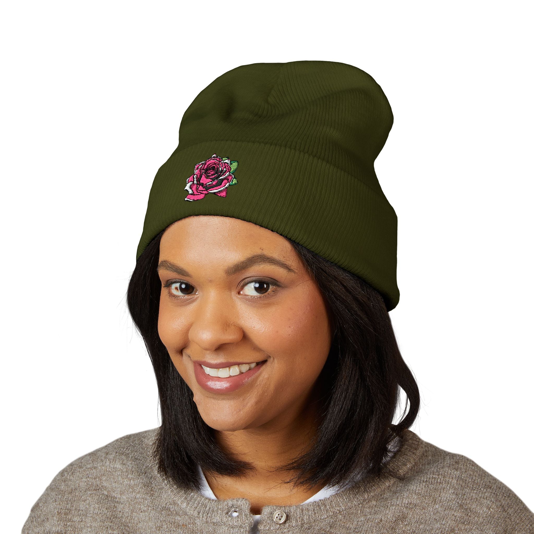 Person wearing a green beanie with 'Never Alone' logo on a white background