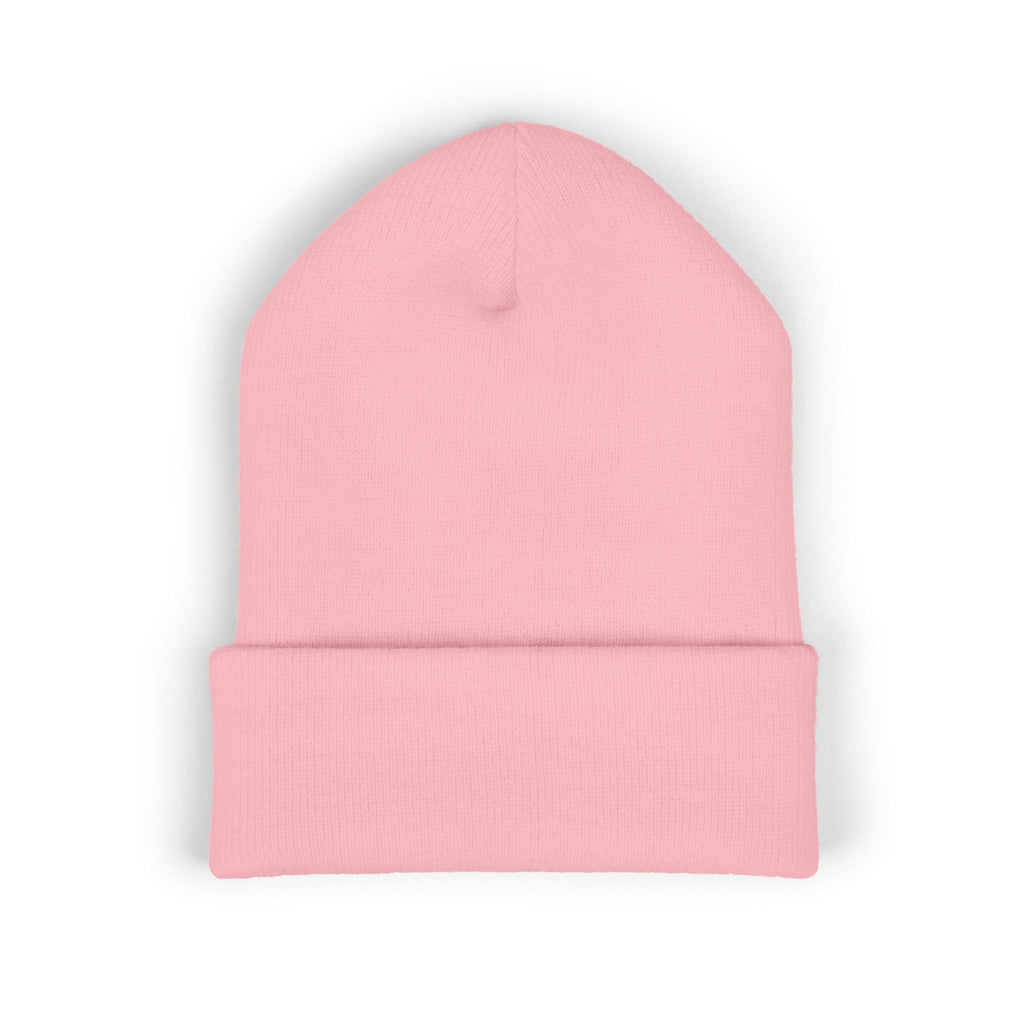 Pink beanie hat on a white background