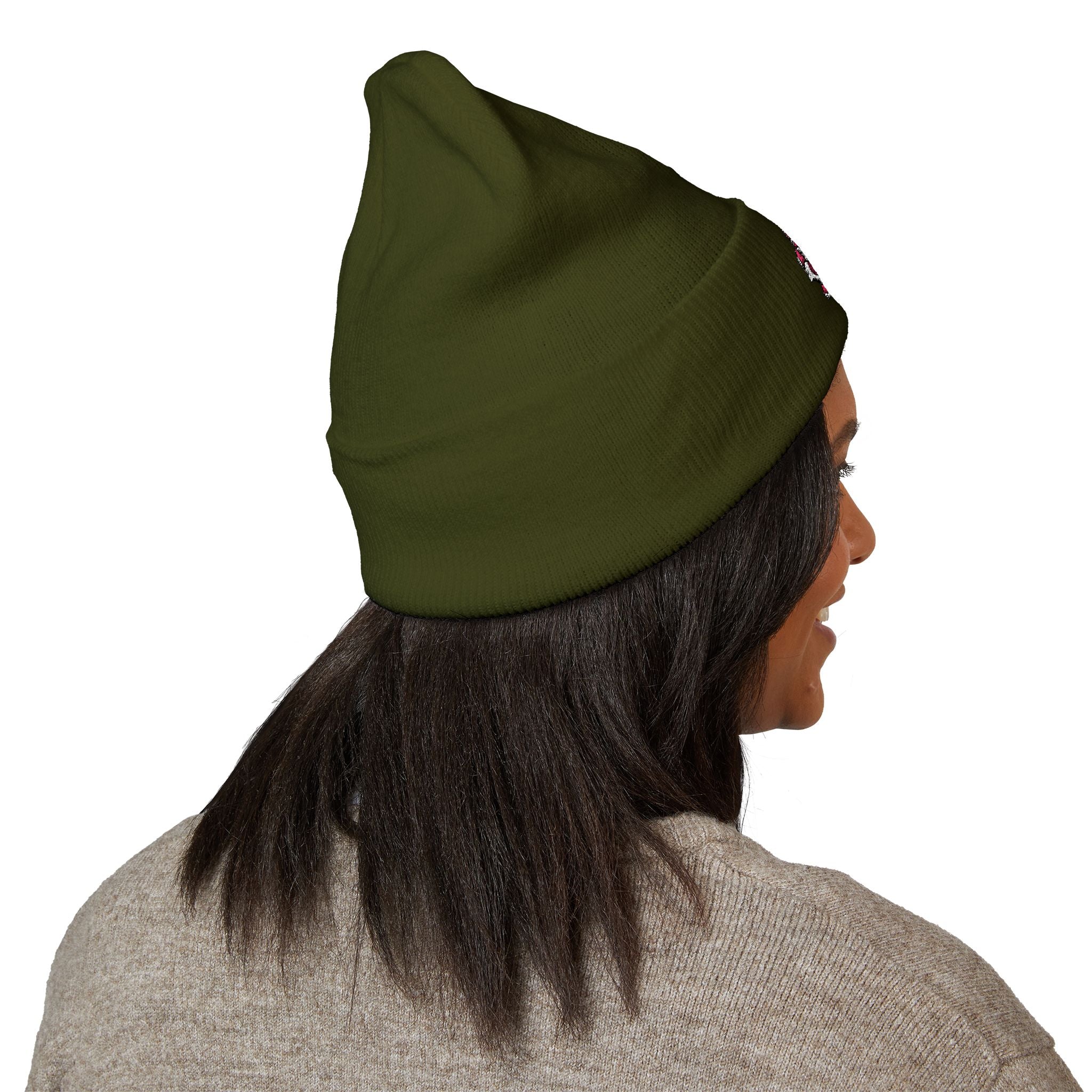 Person wearing a green beanie on a white background