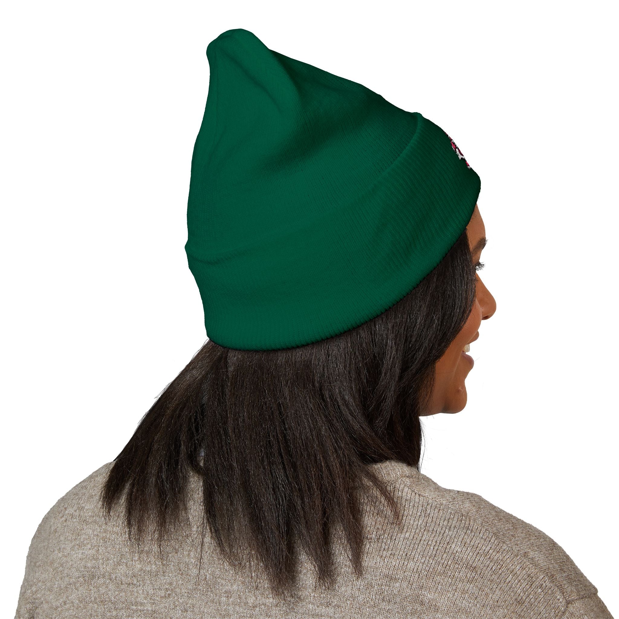 Person wearing a green beanie on a white background