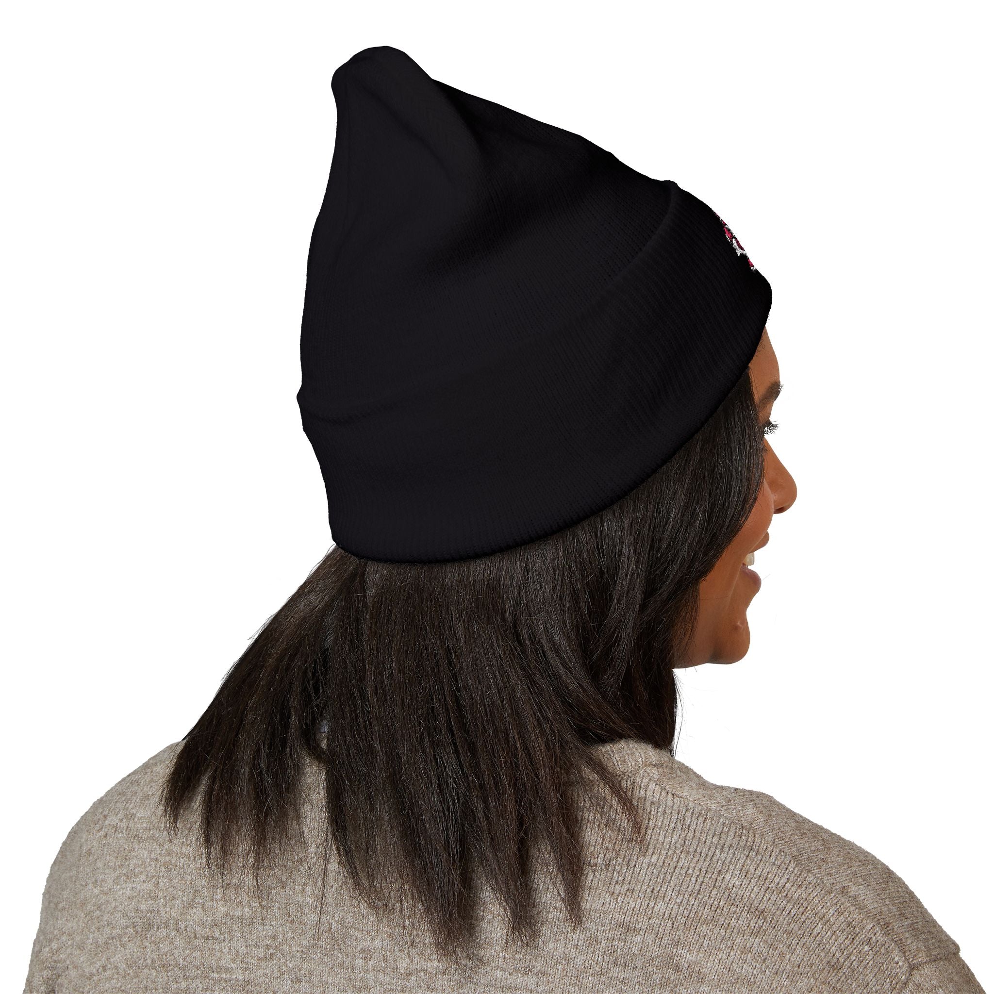 Person wearing a black headscarf on a white background