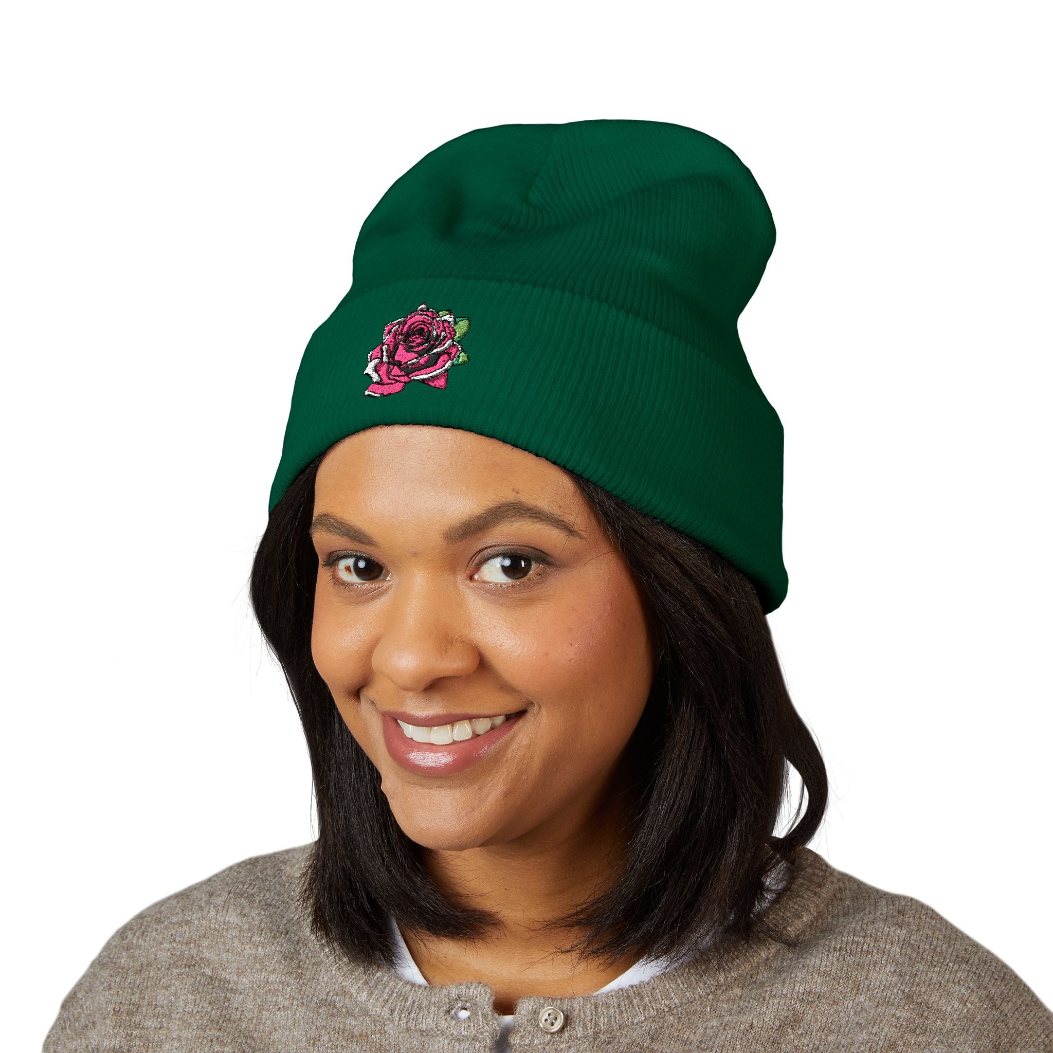 Person wearing a green beanie with 'F44.0' text on a white background